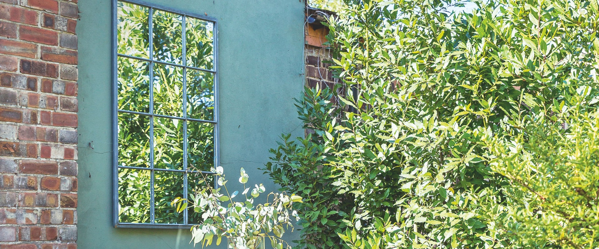 A Complete Guide to Hanging Wall Decor on a Garden Patio